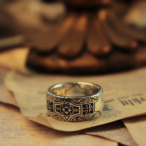 Introducing the exquisite Silveringdom Matching Rings, crafted from dark silver to exude a timeless elegance. Each ring features a prominent cross design, symbolizing unity and faith. The intricate patterns surrounding the cross add a touch of sophistication, making these rings perfect for couples who appreciate both style and meaning. The dark silver material gives the rings a luxurious and antique appearance, ideal for those who cherish unique and regal jewelry. Whether as a symbol of commitment or a stylish accessory, these matching rings from Silveringdom are sure to captivate and inspire. Embrace the elegance and significance of these beautifully crafted rings, designed to stand the test of time.