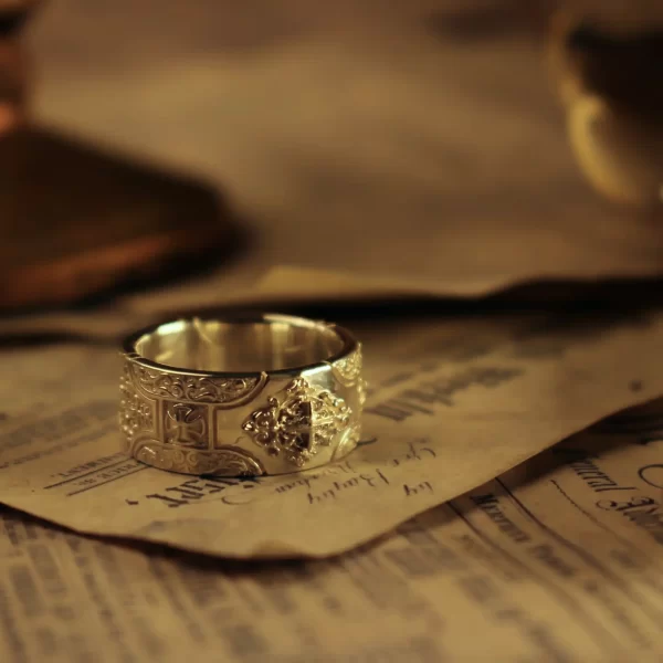 Introducing the exquisite Silveringdom Matching Rings set, crafted in light silver. These rings feature a beautifully detailed cross design, symbolizing unity and faith. The intricate patterns on each ring reflect the exceptional craftsmanship of the Silveringdom collection. Perfect for couples, these matching rings are a testament to timeless elegance and shared commitment. The light silver finish enhances the delicate details, making these rings a standout choice for any occasion. Whether as a symbol of love or a cherished gift, the Silveringdom Matching Rings with their distinctive cross design are sure to be treasured for years to come. Embrace the elegance and significance of these beautifully crafted rings.