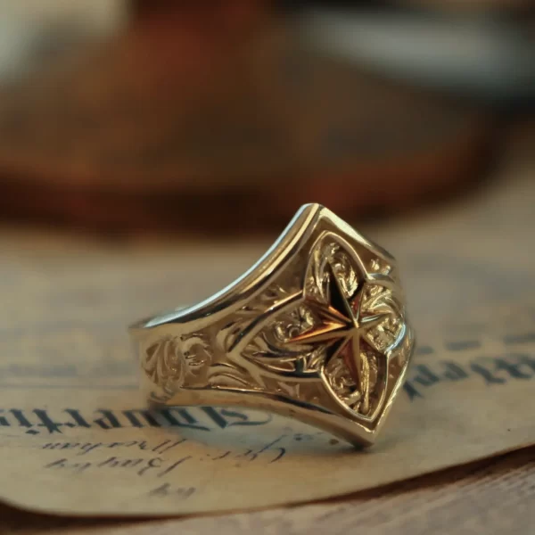 Introducing the Silveringdom Polaris Matching Rings—crafted from light silver, these rings embody elegance and symbolism. Each ring features a central star design, reminiscent of Polaris, the guiding North Star, symbolizing constancy and direction. The intricate patterns surrounding the star evoke a sense of the holy, adding a touch of spiritual significance. Perfect for couples, these matching rings are designed to complement each other, making them a meaningful choice for those who seek a connection that transcends the ordinary. Embrace the artistry and narrative of Silveringdom with these exquisite rings, where every detail tells a story of timeless beauty and profound symbolism.
