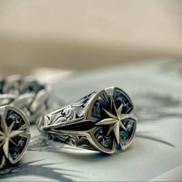 Introducing the exquisite matching rings from Silveringdom, designed to captivate with their unique blend of elegance and symbolism. Crafted in dark silver, these rings feature a stunning Polaris motif at their center, representing guidance and constancy. The intricate design is further enhanced by a delicate rose engraving, adding a touch of timeless beauty. The dark silver hue gives these rings an antique and sophisticated appearance, making them perfect for those who appreciate fine craftsmanship and meaningful designs. Whether as a gift or a personal treasure, these matching rings from Silveringdom are a testament to enduring elegance and the beauty of the Polaris and rose motifs.