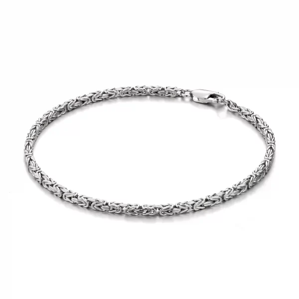 Silveringdom’s Byzantine Bracelet is a tribute to precision and beauty, crafted from pure 925 sterling silver. With its tightly knit, symmetrical pattern, this bracelet is both durable and flexible, offering unmatched comfort for all-day wear. The gleaming silver surface captures light from every angle, creating a subtle shimmer that enhances any ensemble. Inspired by historical armor chains, it speaks of timeless strength and connection while remaining minimalist and elegant. Whether you're accessorizing a business outfit or adding detail to a weekend look, the Byzantine Bracelet delivers style with substance. A secure lobster clasp adds functionality to its graceful form. This is where classic craftsmanship meets wearable luxury—only from Silveringdom.