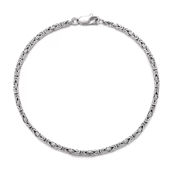 Introducing the Byzantine Bracelet by Silveringdom—an iconic addition to our curated range of 925 sterling silver bracelets. Featuring a complex braided design, this bracelet evokes the elegance of ancient craftsmanship with a contemporary twist. Each link is individually crafted to create a seamless flow, giving the bracelet a fluid, flexible fit that hugs the wrist comfortably. The high-shine finish elevates its sophisticated silhouette, making it suitable for both statement styling and subtle layering. This piece is ideal for fashion-forward individuals who appreciate intricate detailing and long-lasting quality. Whether gifted or self-purchased, it’s a timeless treasure that transitions easily from day to night. Elevate your jewelry essentials with Silveringdom’s artisan touch.